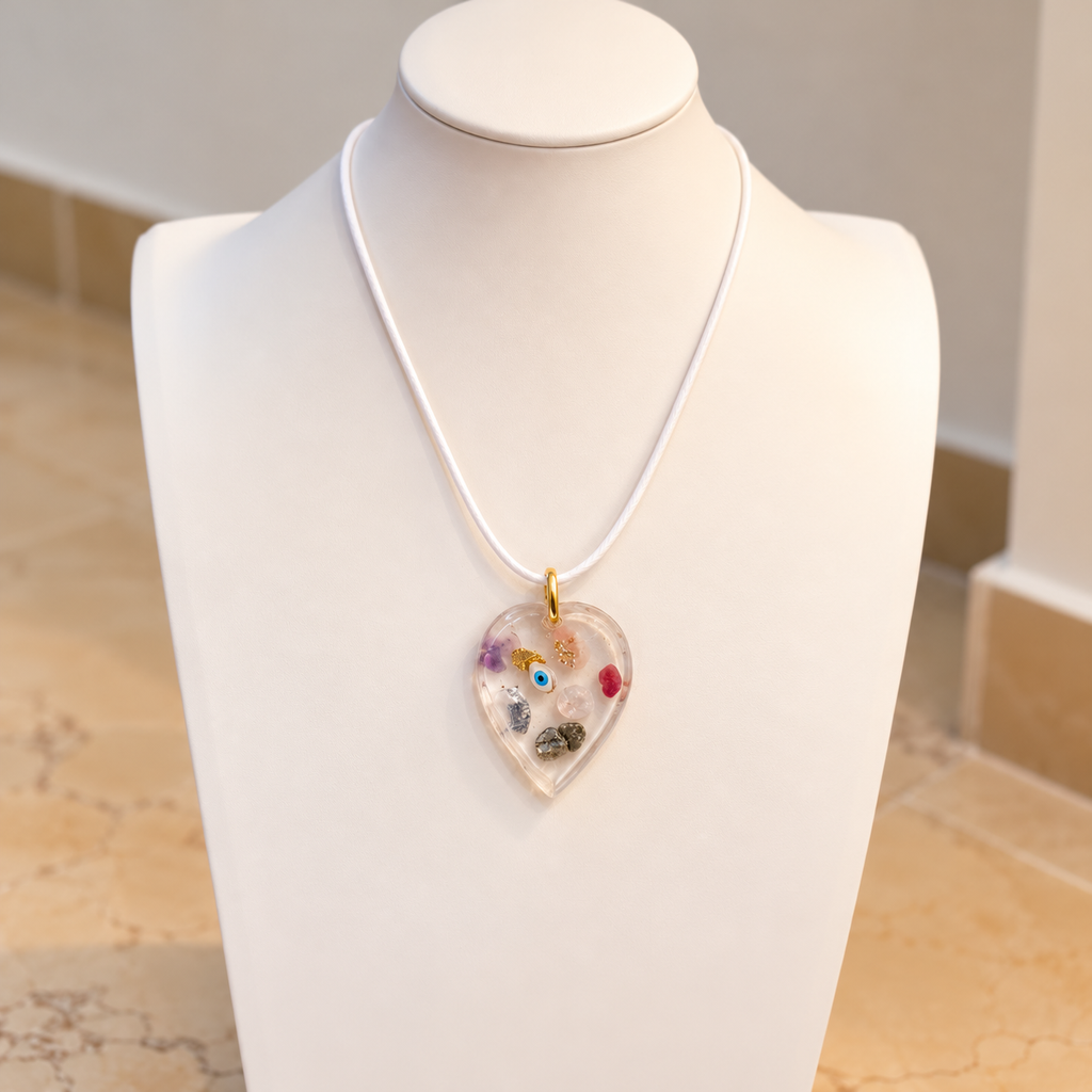 Amulet necklace on ivory bust