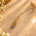 Golden Whisper on cream marble — main product image