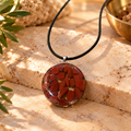 Resolute red jasper pendant on cream marble