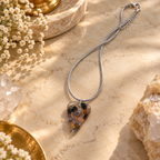 Tranquil pendant on cream marble